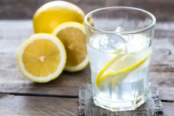 Hydration: The Secret Ingredient for a Toned Stomach and Enhanced Fitness 2 Image of lemon water to aid hydration Birmingham